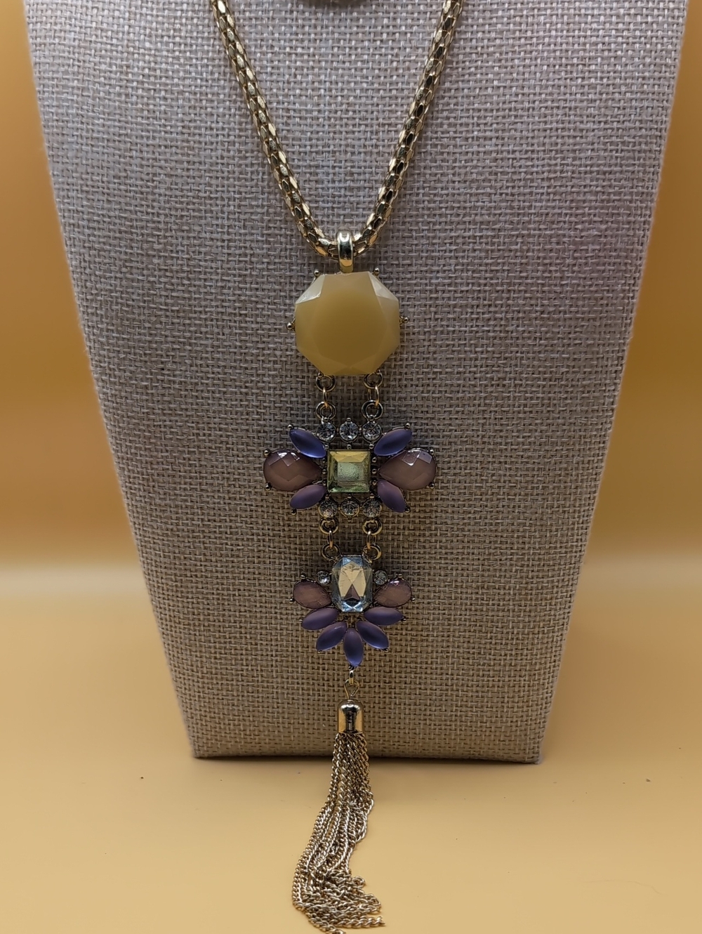 Gold-Tone Necklace with Yellow and Purple Gem Pendant and Tassel